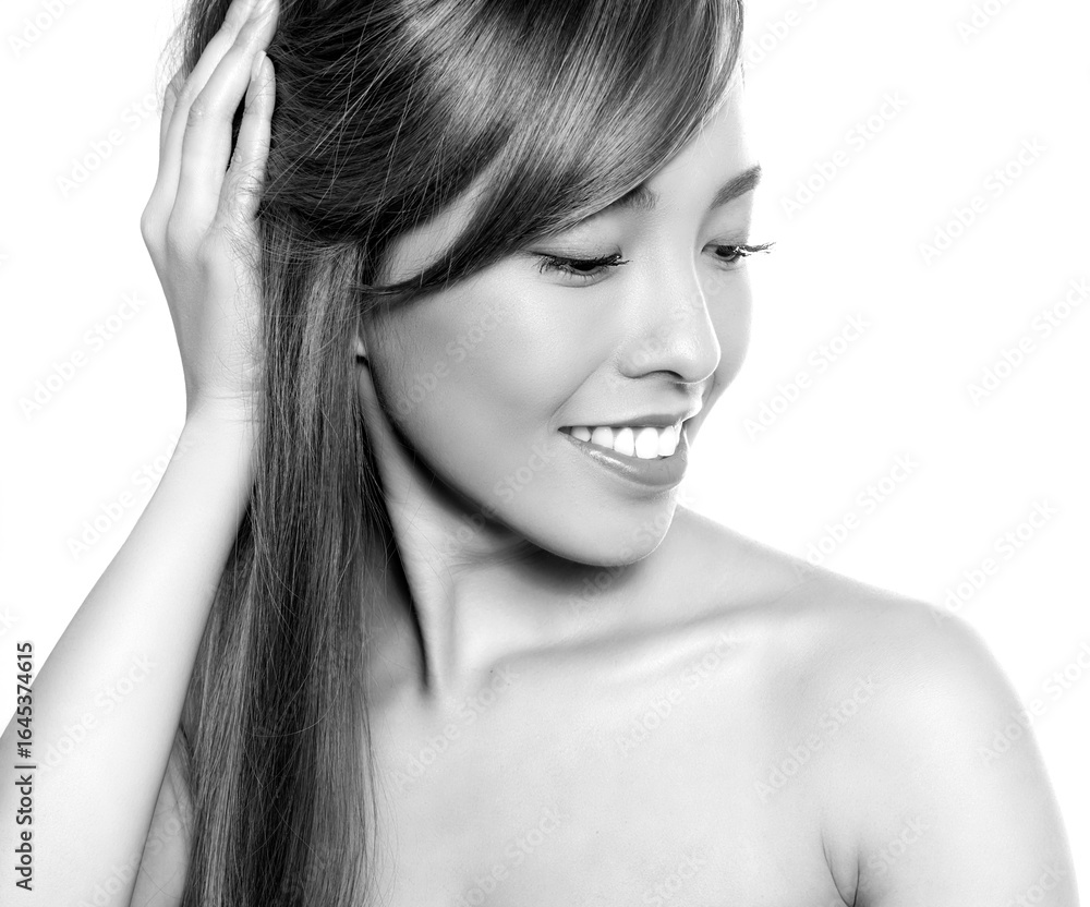 Fototapeta premium Beautiful asian woman with long dark and healthy hair and clear skin