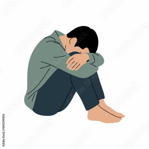 person sitting with knees