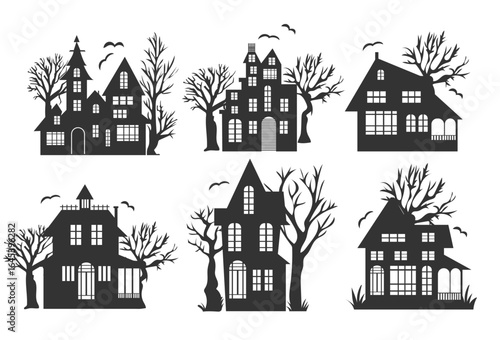 Spooky silhouette houses with eerie trees and bats during twilight in a Halloween-themed landscape