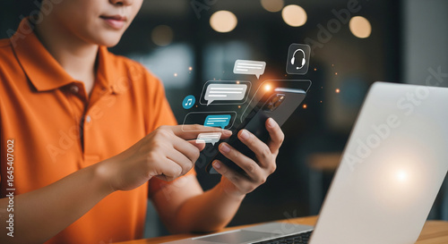 Person Using Smartphone with Chat Bubbles and Icons