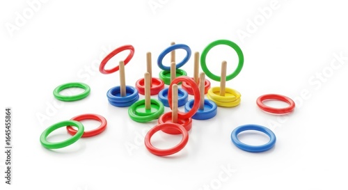 Colorful ring toss game with wooden pegs isolated on white background