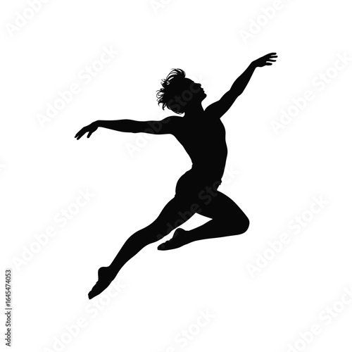 Silhouette of a female ballet dancer leaping gracefully in mid air