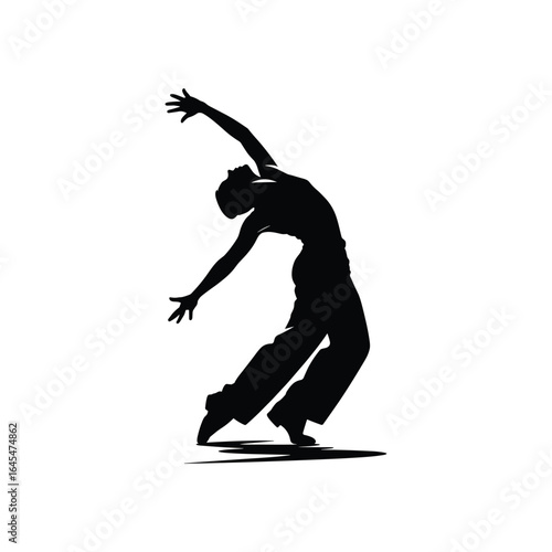 Silhouette of a dancer in a dynamic pose with flowing movements