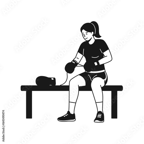 Boxer Preparing: A determined athlete prepares for her boxing match. The focus on the goal represents the commitment to physical fitness and determination.