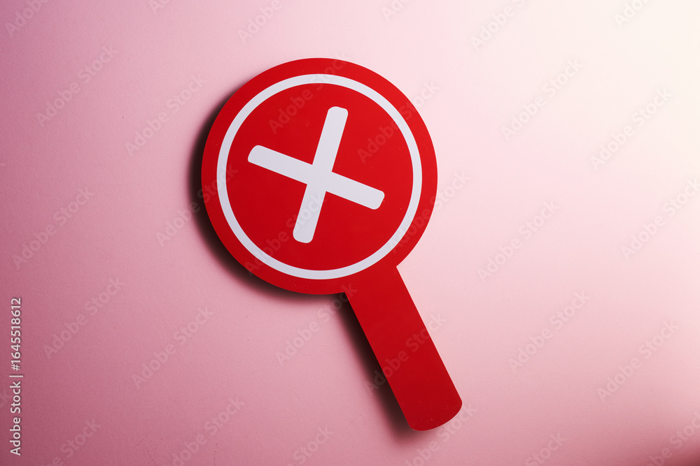 Fototapeta premium stick with red cross sign