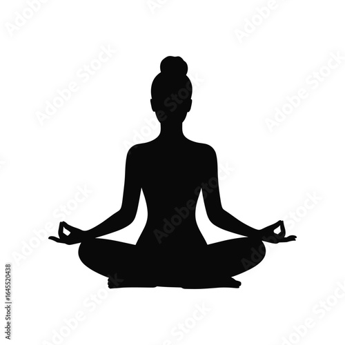 Silhouette of a woman meditating in a lotus pose with hands in gyan mudra