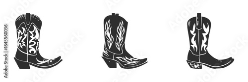 Three pairs of decorated cowboy boots.