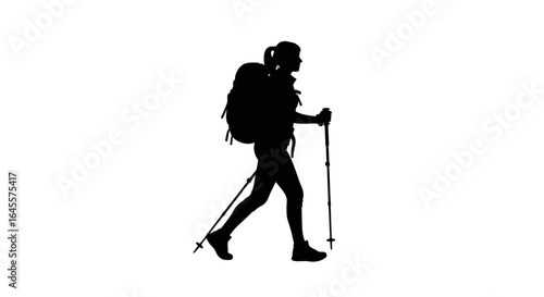 silhouette of a female hiker with backpack and trekking poles adventure travel and outdoor exploration concept