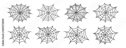 Six intricate spider webs in a grid pattern.