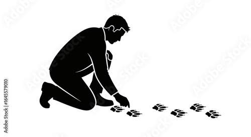 investigating the trail a businessman examining animal tracks symbolic of following market trends and unveiling opportunities