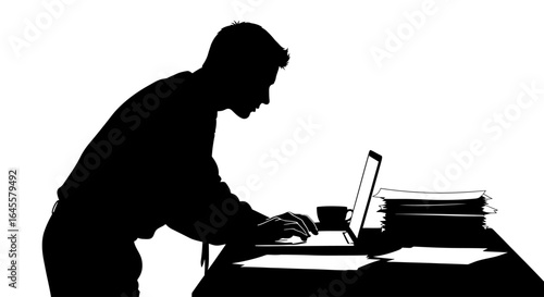 focused professional working late silhouette of a businessman utilizing laptop and documents for efficient project completion