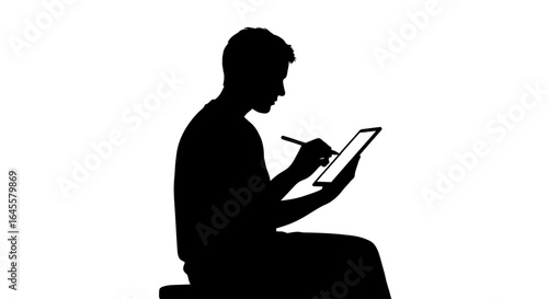 silhouette of a focused designer using a stylus on a tablet illustrating digital creativity and modern workflow solutions for graphic design projects