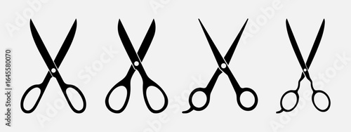 Four pairs of black scissors.