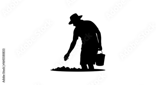 silhouette of a farmer planting seeds representing growth hard work and the agricultural industry