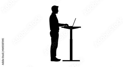 silhouette of man working at adjustable standing desk improve posture boost productivity and enhance workplace wellness