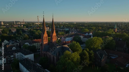 Wallpaper Mural Aerial drone view of St. Marien Church in Herne, North Rhine-Westphalia, Germany – historic Catholic church with tower and surrounding urban landscape seen from above. 10 September 2024 Torontodigital.ca