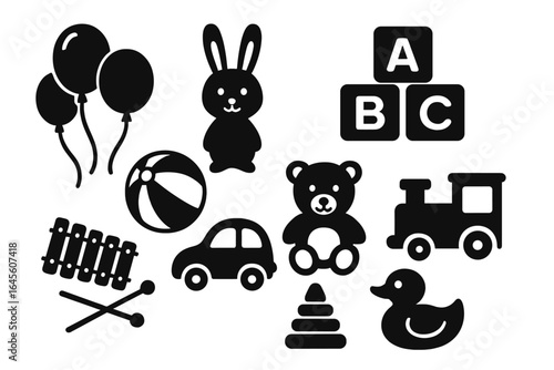 Set of baby toys icons. Black silhouette collection for kids. Includes teddy bear, car, train, duck, bunny, ball, and blocks. Childhood, playtime, and kindergarten concept.