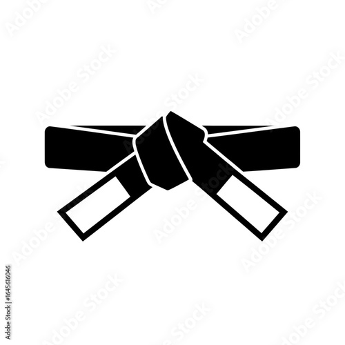A black belt is tied in a knot showing the ends of the fabric.