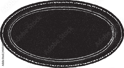 Close-up macro shot of a black leather texture with a vintage design, highlighting the intricate pattern of the old, weathered material