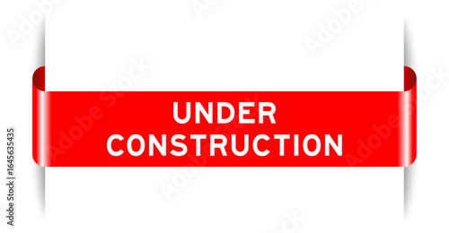 Red color inserted label banner with word under construction on white background