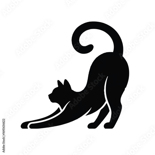 Black silhouette of a cat stretching on a white background