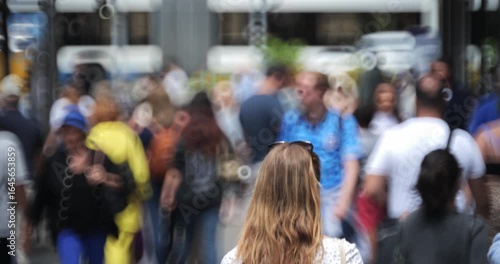 Wallpaper Mural Blurry, defocused, unrecognizable people walking  on a busy street sidewalk. Sunny summer day, real time, doughnut bokeh background, mirror lens Torontodigital.ca
