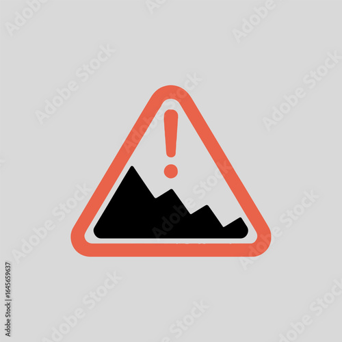 A triangular sign with rounded corners containing a black mountain and an exclamation point symbol