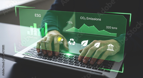 Person using laptop with esg and co2 emissions data overlayed on the screen showing sustainability