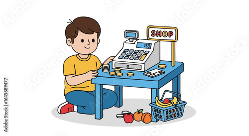 Little boy playing shop with a toy cash register and fruit.