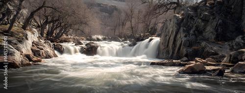 Waterfall into foamy river