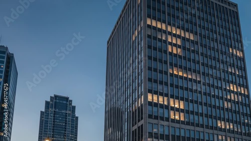 Slow Pan Up Of City Buildings With Cinematic Lighting And Blue Sky