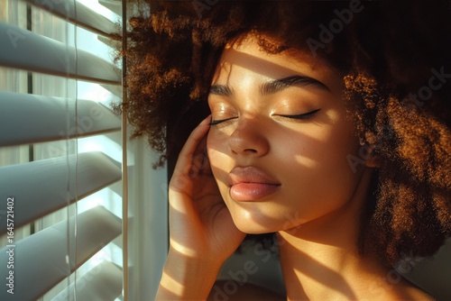 Natural Light Streaming Through Blinds Highlights Womans Serene Expression an...
