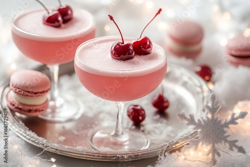 Refreshing Pink Cocktails With Cherries and Macarons on a Festive Tray During...