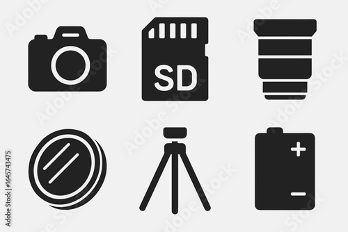 Photography equipment icon set — camera, SD memory card, lens, filter, tripod, battery — black silhouette vector