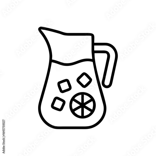 Clear pitcher filled with lemonade and ice cubes and lemon slices  