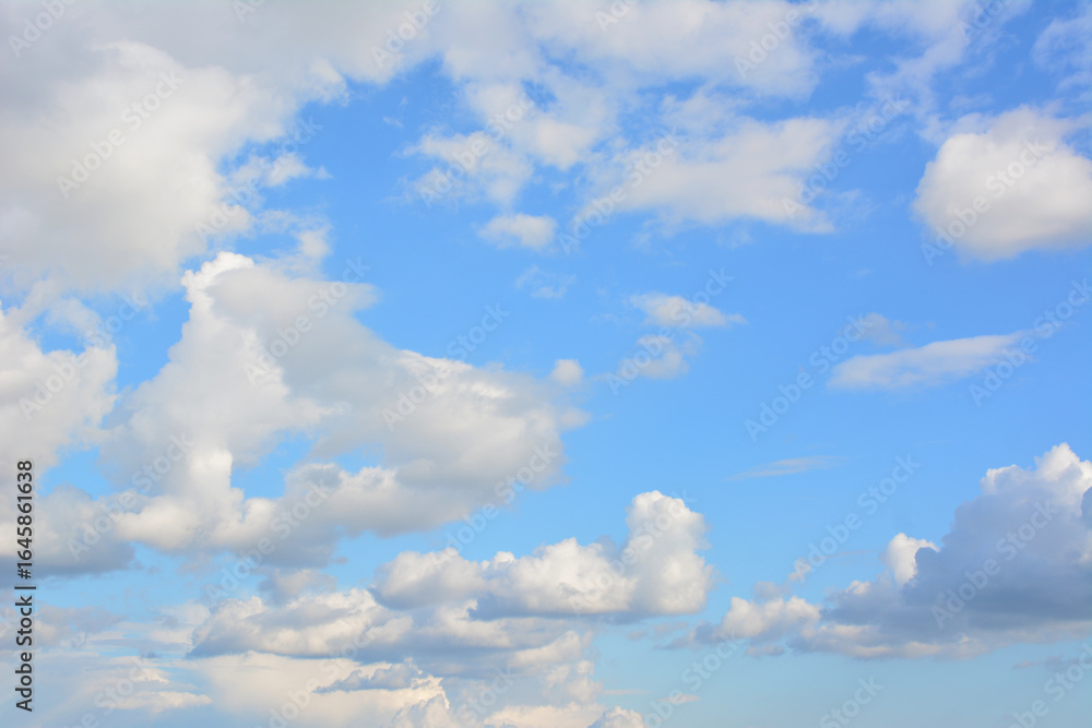 Fototapeta premium Bright Blue Sky with Fluffy White Clouds
