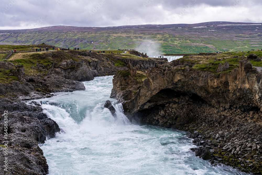 Fototapeta premium Godafoss, or Waterfall of the Gods on the river Skjalfandafljot near Akureyri in Northern Iceland is a popular tourist attraction