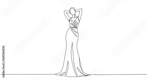 Elegant woman posing confidently in a striking floor-length gown with a dramatic flair