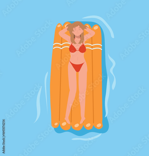 woman in red bikini relaxing on orange inflatable mattress floating in swimming pool during sunny tropical summer vacation