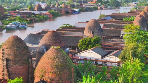 Aerial view of Mang Thit brick kiln in Vinh Long. Burnt clay bricks used in traditional construction of Vietnamese, Mekong Delta, Vinh Long province, Vietnam