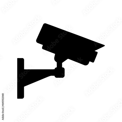 Security camera on the wall for surveillance and protection of private and public areas with video recording