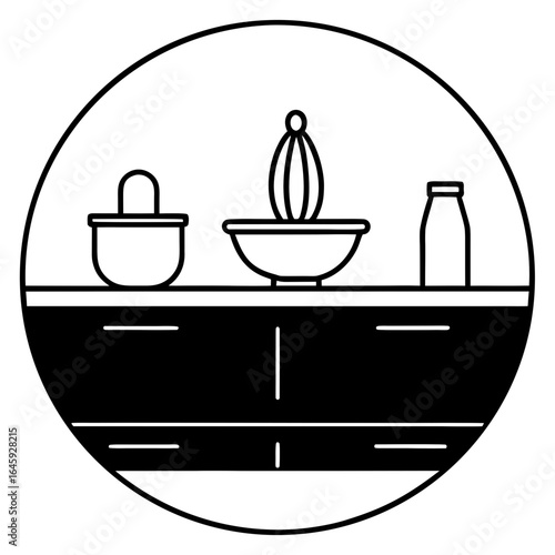 Modern kitchen counter with marble top, wooden utensils, and ceramic bowls.