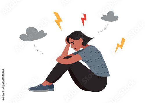 A depressed woman is immersed in her sad thoughts. A frustrated woman sits with her arms wrapped around her legs, lost in sad thoughts. The concept of mental disorder, sadness and anxiety.