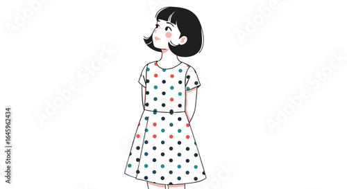 Young girl in polka-dot dress looking up with a dreamy expression and joyful smile