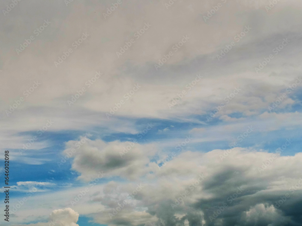 Fototapeta premium Dramatic cloudy blue sky. Nature background for design and sky replacement.