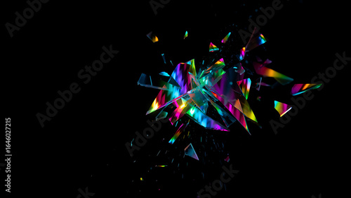 Abstract explosion of vibrant rainbow light shards and particles against a stark black background creating a dynamic and energetic visual effect