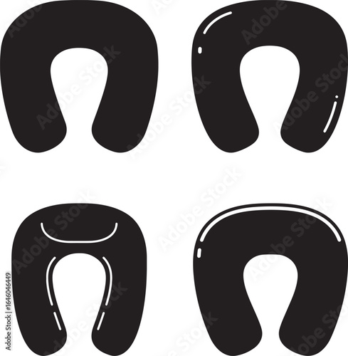 Four black horseshoe shapes in a grid representing good luck symbols silhouette
