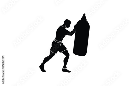 Silhouette of a boxer hitting a punching bag with a dynamic stance and movement in a training session