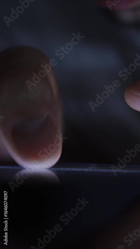 Smartphone and social network addiction concept. Hands using smartphone in bed at night