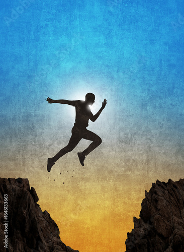 Man leaping over the gap A symbol of overcoming obstacles and achieving goals.